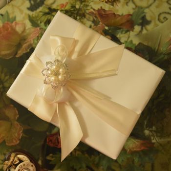 Gift Wrapping with Rhinestone Brooch and Confetti